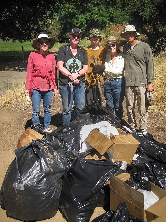 The second trash pile with intrepid collectors, from left: Barbara Gardner, Karen Hirsch, Toby Olson, Nancy Gilbert and Don Thornberry.