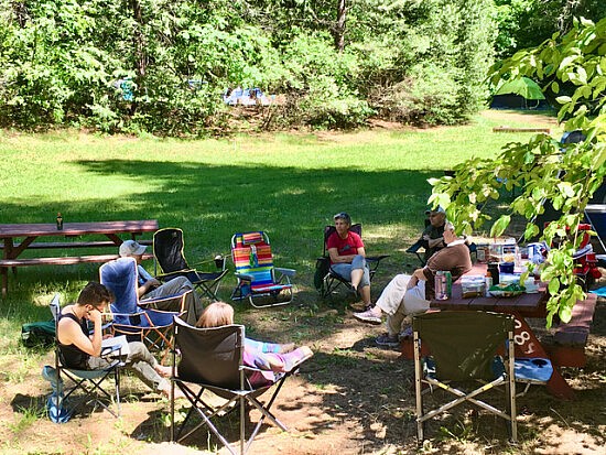 People sitting outdoors in a circle