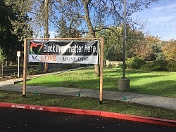 Black Lives Matter Here Banner Dedication