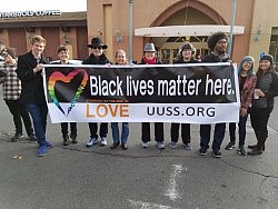 Our banner waved proudly at the Reclaim MLK March