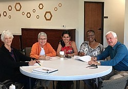 EJ Committee Members preparing for BCLC AA Meeting