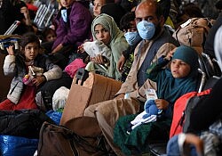 Afghan-refugee-standard-scale-2_00x