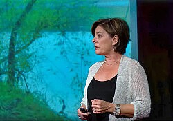 Dr-Kate-Transchel-giving-a-Ted-Talk-on-human-trafficking-standard-scale-2_00x