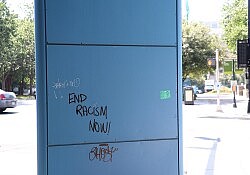 1200px-End_Racism_Message_on_Sign_in_Charlotte_George_Floyd